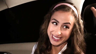 Hot babe in a mini skirt has sex in a vehicle