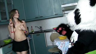 A panda suit is seen with a strap on, penetrating a sexy slit