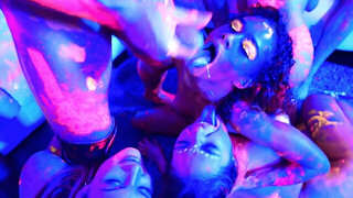 Covered with neon paint lovelies have group sex in blue light