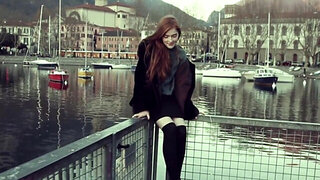 Redhead with a great natural body is playing in the room