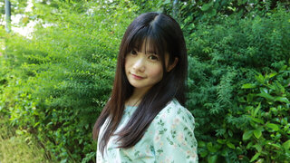 Ringo Fujii acting adorable while posing in the woods