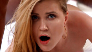 Hung black man with a huge dick is banging a blonde chick