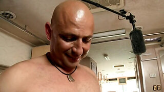 Busty brunette sucks hard cock in fornt of the other girls