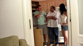 A mature man is eating out the pussy of a young chick