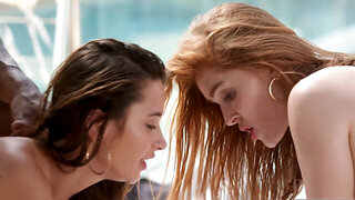 Redhead and Brunette Babes In Pool Foursome With Big Black Cocks