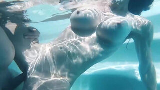 Underwater fuck with a big boobs brunette babe