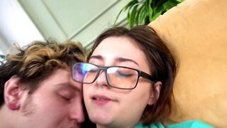 Nerdy girl blows that horny guy and rides him on the couch