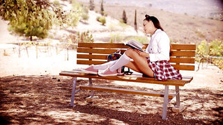 Brunette with cute spacebuns masturbates outdoors