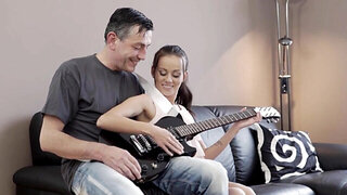 Guitar playing older guy gets to fuck a brunette babe
