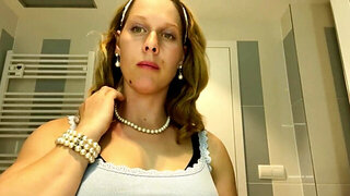 Ugly mom fondles her boobs while putting her make up on