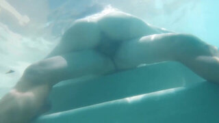 Underwater fuck with a big boobs brunette babe