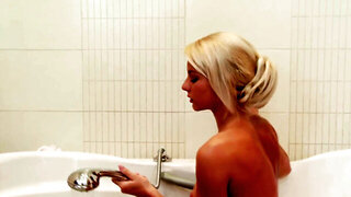 Radiant blonde ho moans loudly over teasing cunt at bathtub