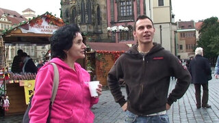 Intergenerational couple fools around on the floor