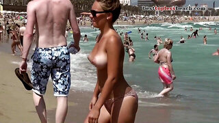 Gorgeous boobs Topless on the Beach