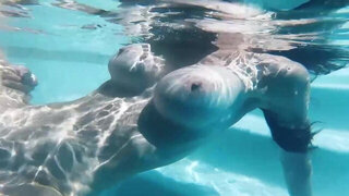 Underwater fuck with a big boobs brunette babe