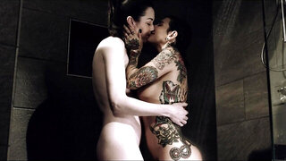 Brunette lesbian and tattooed stepmom have fun in the shower room