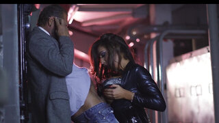 A girl is with two black guys that are giving her a double penetration