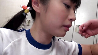 Kawaii Tomomi Motozawa pulls up her T-shirt to taste a cock