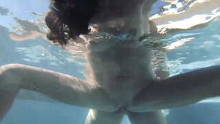 Slim mature mom enjoys underwater sex with her stepson