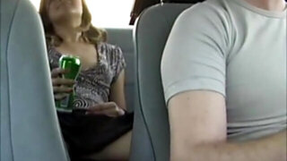 Busty girl gives head in the car