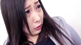 Sublime Japanese girl with natural tits takes two dicks