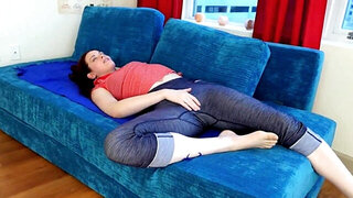 Girl's pussy is wet and she plays with it on the couch