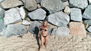 Inked blonde girl with a tight hole fucked on a beach