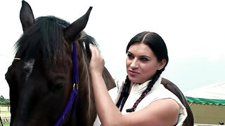 Busty brunette is down for a quickie with a stable lad