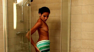 MILF from Hungary fucks herself in the shower stall