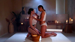 Two girls with oily bodies enjoying hard fingering here