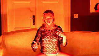 Lonely girl lights candles and takes off clothes