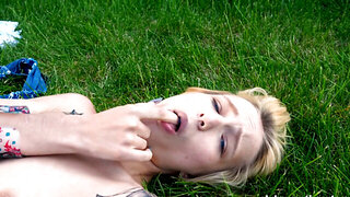 Hot Blonde On The Lawn Waters Her Pussy With A Squirt Gun