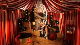 Brunette in an old timey carnival setting