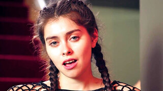 Brunette in a revealing outfit seeks pleasure on the steps