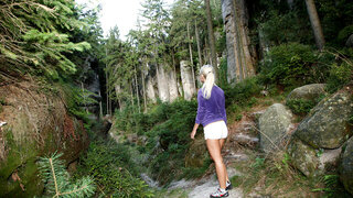 Blonde Teases Her Pussy on a Mossy Cliffside Trail