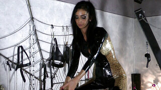 Kinky mistress is playing with gimp's dick in BDSM dungeon