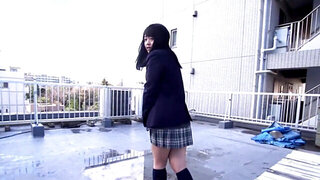 Japanese girl masturbates on the roof before fucking