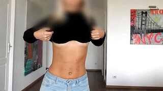 Cute babe prefers to stay anonymous when strip teasing