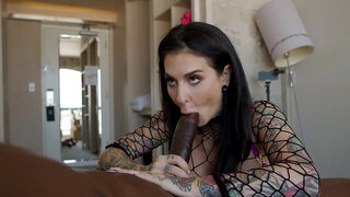 Bimbo with lots of tattoos is taking on a big black cock