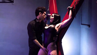Domination session for a very busty brunette goth girl