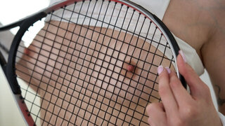 Tennis lover flashes her muff through the racket