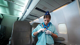 Stewardess removes her outfit after being alone in a plane
