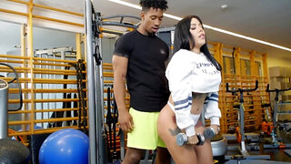 Thick Latina bangs black fitness instructor in a gym