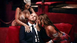 Two smoking hot babes are sharing lucky fellow's cock