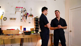 HD scene with a couple of mechanics banging at work