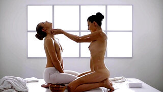 Lesbians with oiled-up bodies are going to finger each other