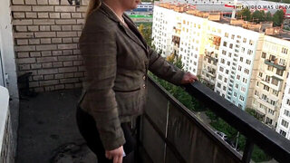 Mature Russian whore shows off butt and twat outdoors