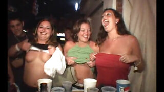 Excited girls flash assets during awesome parties