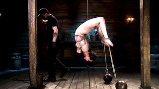 Submissive girl Casey Calvert endures a strict bondage