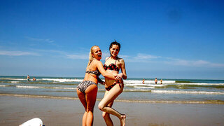 Group lesbian sex licking pussy on a sunny day at the beach